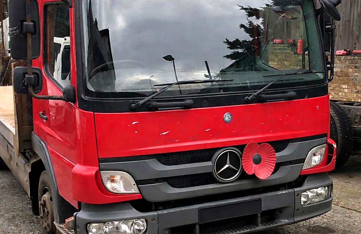 Red Mercedes commercial truck